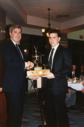 Greg Brown receiving an award