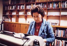 Library clerk typing in the library