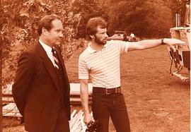 Neil Snider and Rick Wiebe pointing to something outside