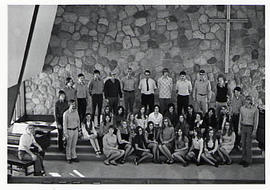 Concert choir posing in the chapel