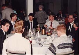 Students and other guests at their table