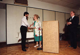 Mrs. Donna Denny presenting an award to Dale Theissen